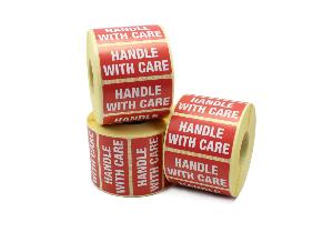 Handle With Care Labels, Red and White, Permanent adhesive. 50mm x 25mm.